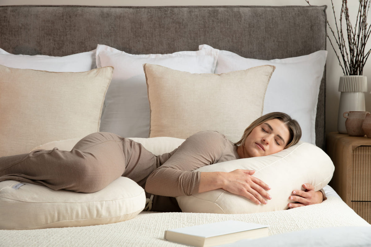 Amarae sculptural support pillows styled in a serene bedroom