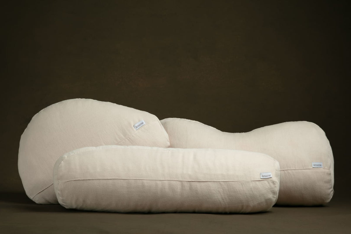 Amarae pillow styled in a serene bedroom setting