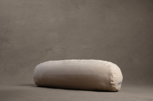 Amarae Baguette body pillow in natural linen, designed for comfortable sleep positioning, full-body support, and restorative rest.