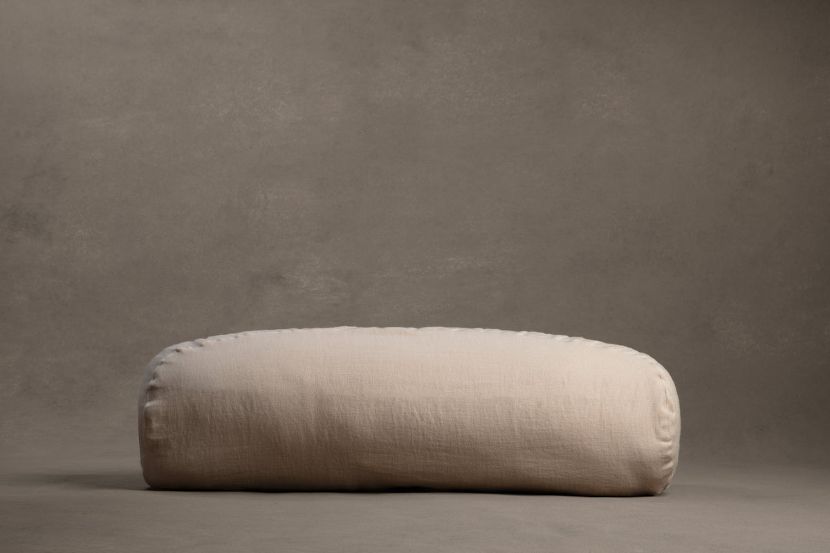 Amarae Baguette body pillow in natural linen, designed for comfortable sleep positioning, full-body support, and restorative rest.