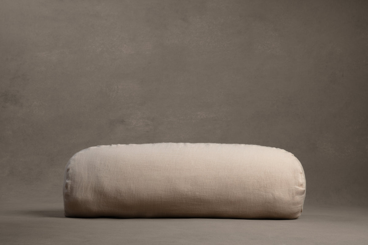 Amarae Baguette body pillow in natural linen, designed for comfortable sleep positioning, full-body support, and restorative rest.