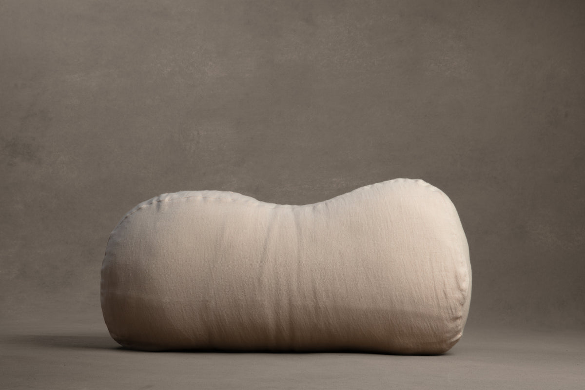 Amarae Guitar lumbar support pillow in natural linen, designed for ergonomic comfort, relaxation, and supportive sleep positioning.