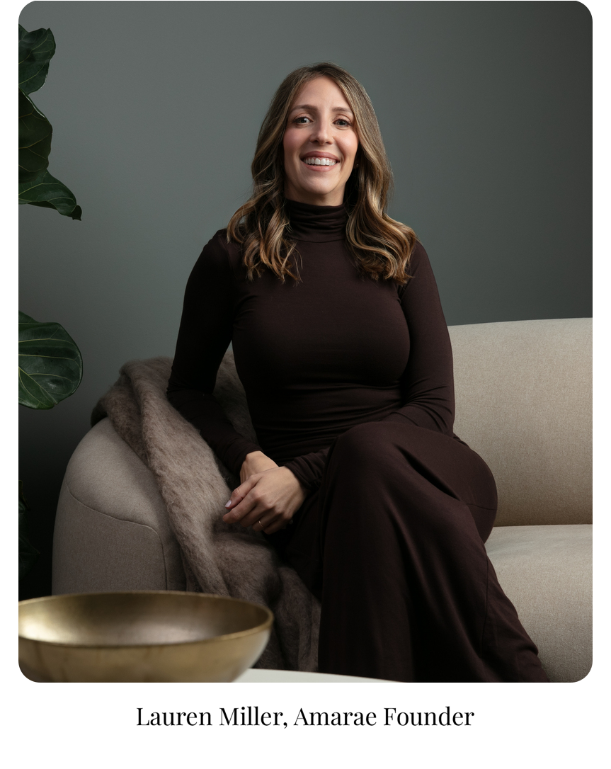Amarae Sleep founder Lauren Miller seated beside a sculptural Amarae pillow